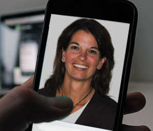 Woman on screen of smartphone