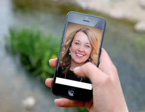 Woman on screen of smartphone